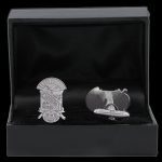 Silver jewelry set in a black display case