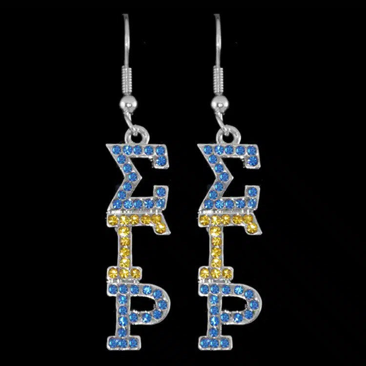 Earrings with blue and yellow letters on a black background