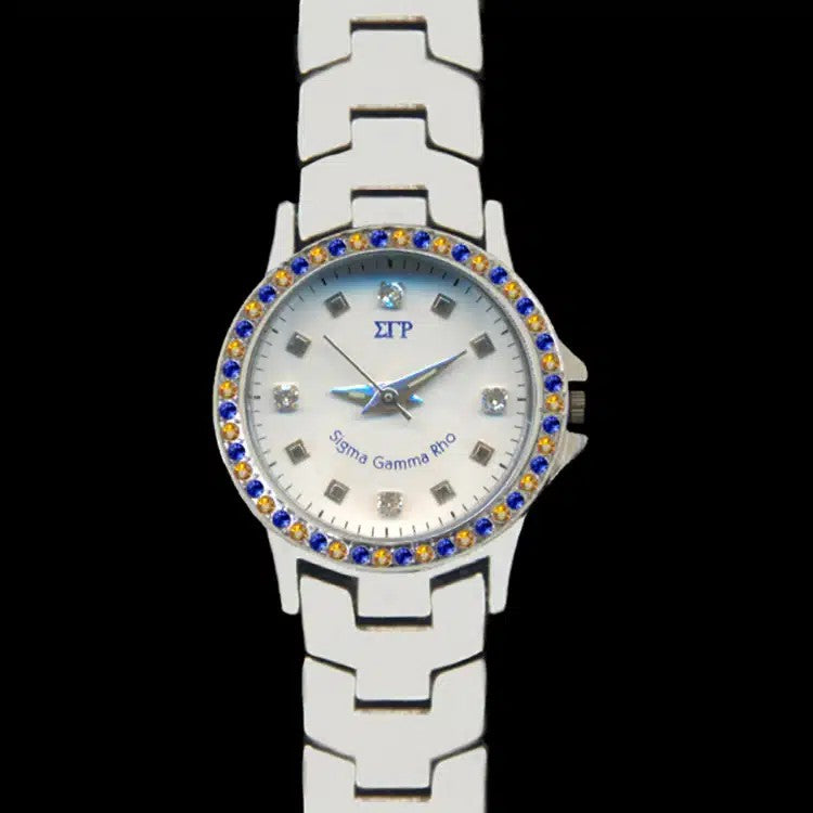 Silver watch with colorful gemstones on a black background