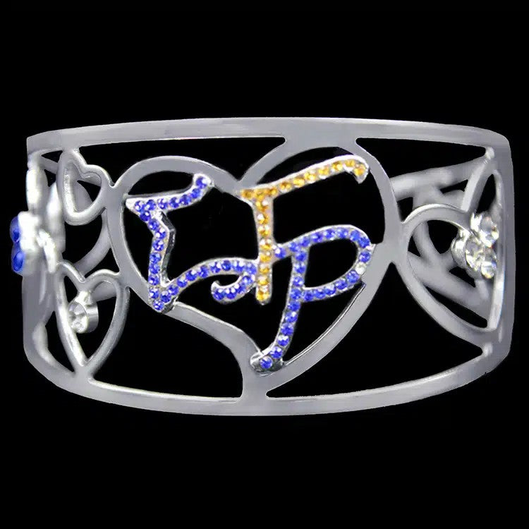 Decorative headband with 'TF' letters in blue and yellow on a black background