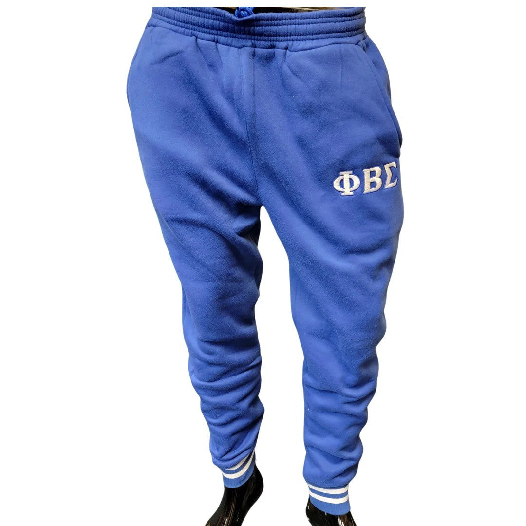 Blue sweatpants with 'ΦΒΣ' logo on a white background