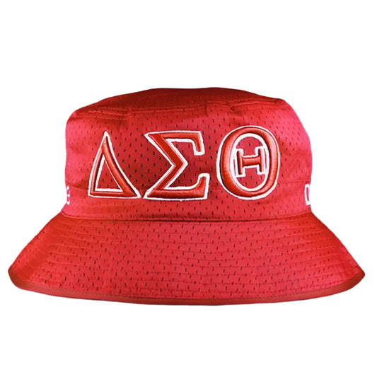 Red bucket hat with white lettering on a black background