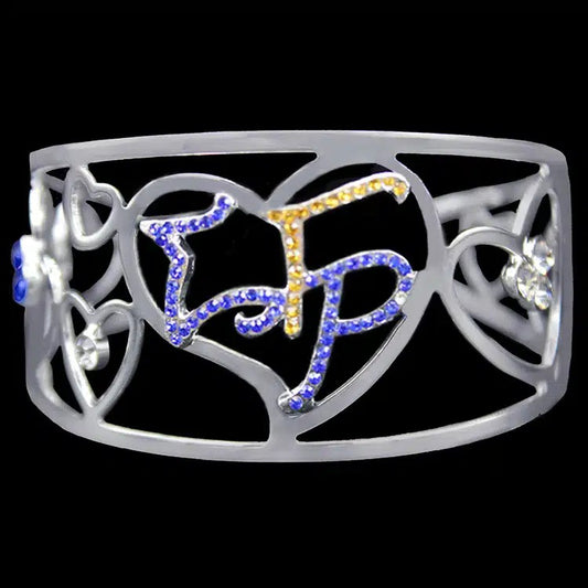 Decorative headband with 'TF' letters in blue and yellow on a black background
