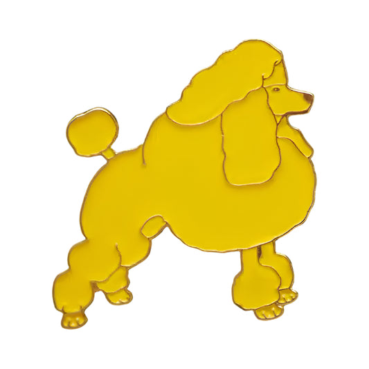 Gold poodle-shaped pin on a black background