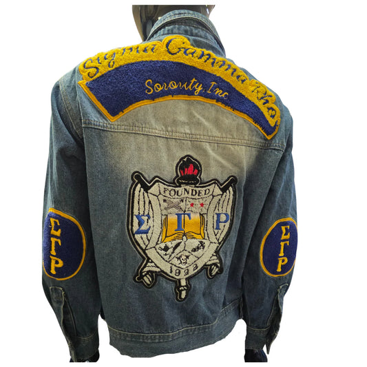 Denim jacket with Sigma Gamma Rho sorority patches on a white background