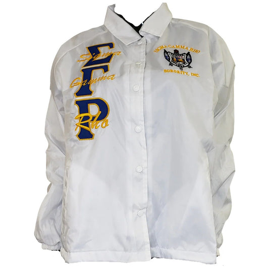 White shirt with embroidered text and logos on a white background